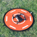 Helipad in gras met drone